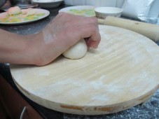 Shaping dough balls